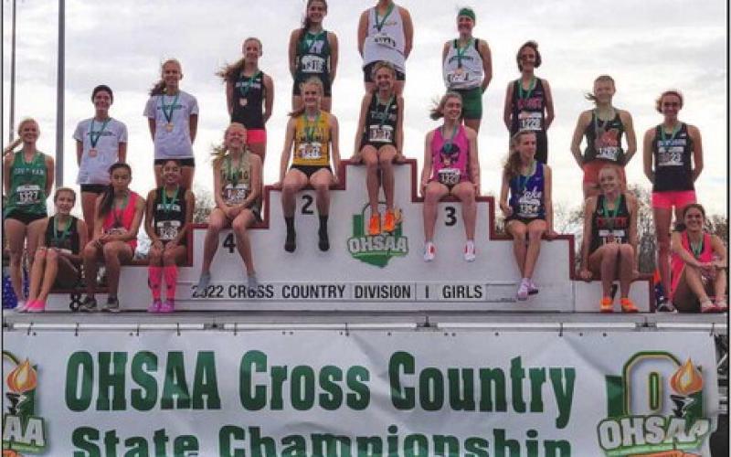Perrysburg High School sophomore Natalie Sanders received the honor of sitting on the podium with her 14th overall finish at the 2022 OHSAA Division I Girls Cross Country Championship. Sanders completed the five kilometer race in 18 minutes 40.3 seconds.