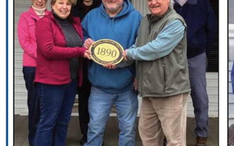 Historic Perrysburg Inc. distributed two plaques recently. Pictured above left, at the home of Connie and Mike Kazmaier, 25875 Lime City Road, are from left, in back, Mary Merrick, Joanie Graver and Grant Garn; front row, Connie and Mike Kazmaier and Dave Kleeberger. Pictured at right, at 429 Cherry Street, home of Sarah Rumple, are, in