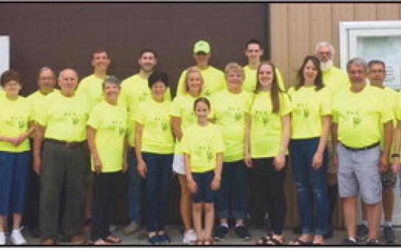 PCU volunteers in front of food pantry.