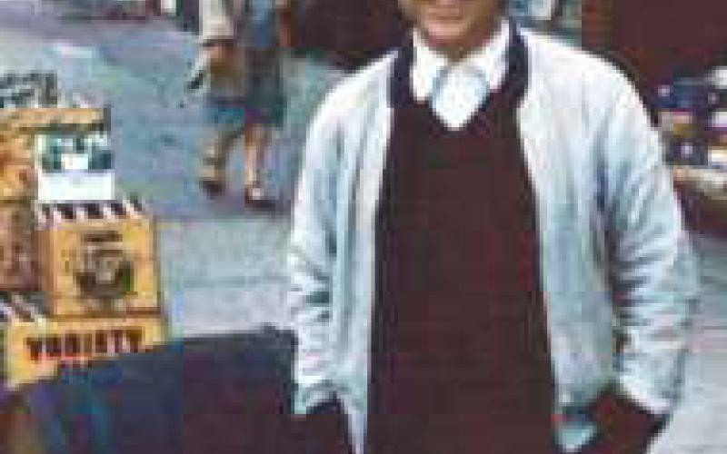 Roy Mercurio, owner Peoples Market, mid 1950s.