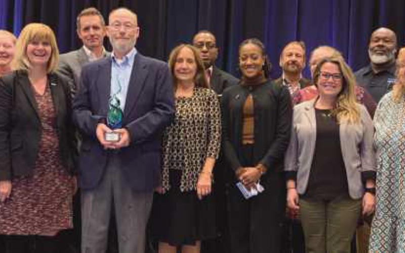 Don Glaza, third from left in the front row, with TARTA personnel at the Ohio Public Transit Association convention.