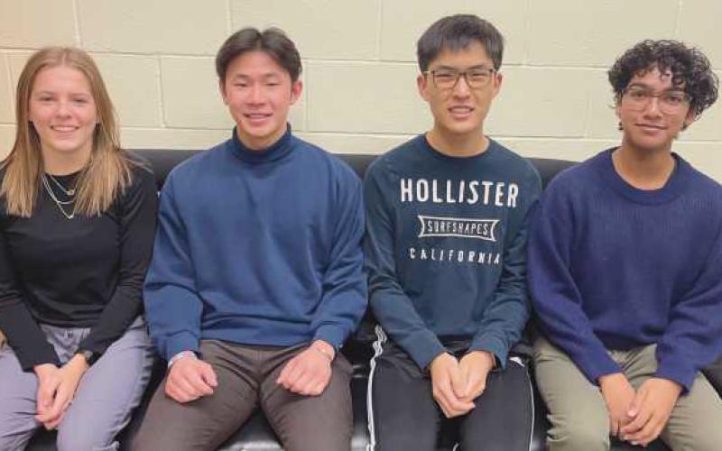 The Board of Education honored Perrysburg High School's four National Merit Finalists at their regular March meeting. Left to right: Ella Sibbersen, James Xiao, Andrew Chung and Nikhil Methi.