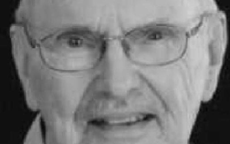 ARTHUR J. RUESS