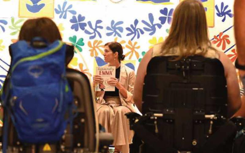 Author Amy Webb reads her book “Awesomely Emma” during a TMA program in the summer of 2022.
