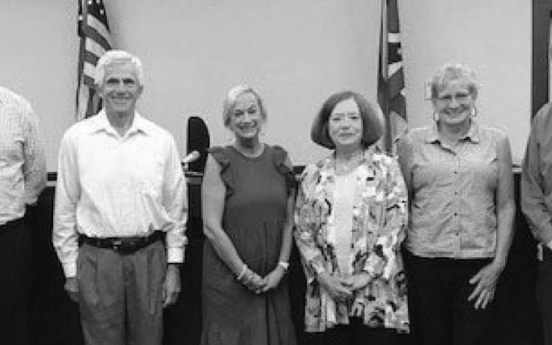 Judge Dave Woessner, far right, administered the oath of office to the five new Court Appointed Special Advocates, from left, Kevin Braun, Travis Chapin, Anne Clark, Eva Zuchowski and Beth Cooksey.
