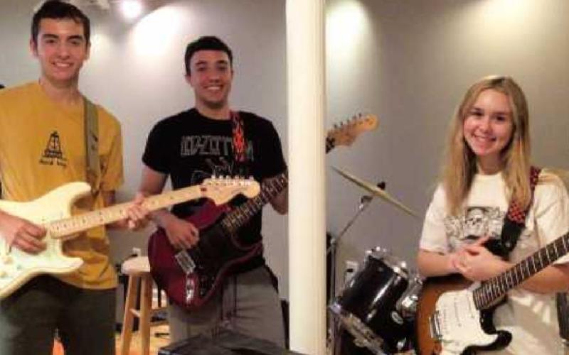 Ricardo Amezquita-Cadavid on guitar, Jack Terry on guitar, Merritt Backus on guitar and keyboard and Autumn Edwards, on drums (not pictured).