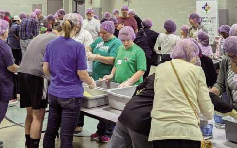 Zoar Lutheran Church packs food with Sew Hope