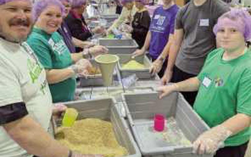 Zoar Lutheran Church packs food with Sew Hope