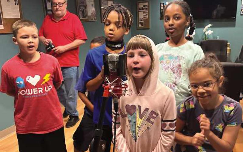 Students learned about the music business, creating an album cover and recording a song in the Center of Hope’s studio.