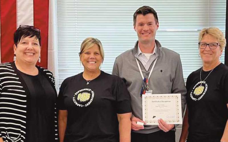 Perrysburg Junior High School Principal Scott Buker was presented with the Spring 2023 Shining Star Award.