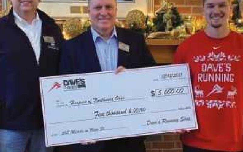 Run Toledo donates $5,000 to Hospice