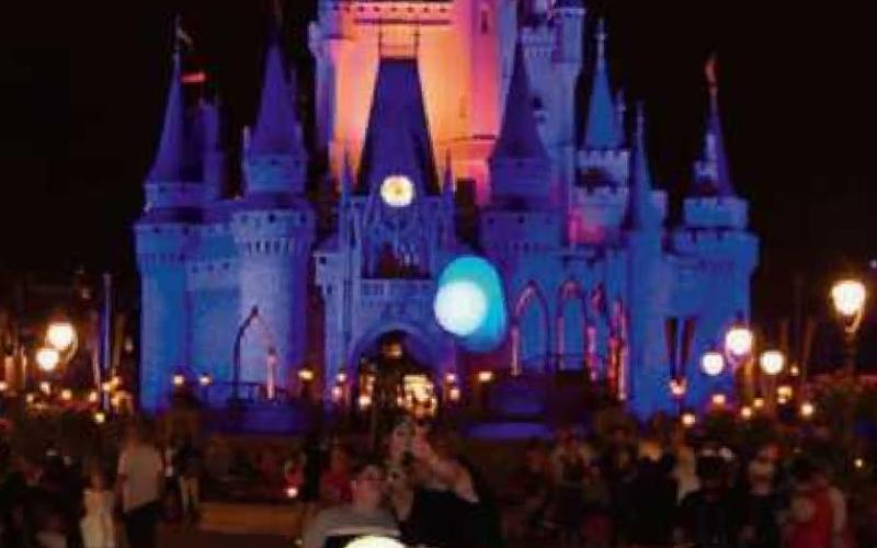 Jaydon practices in front of the Magic Kingdom Park at Walt Disney World Resort in Florida.
