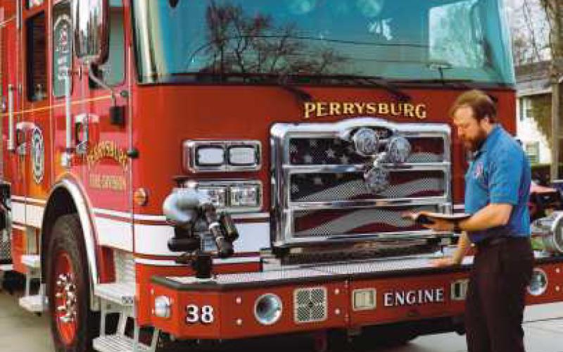 Pastor Taylor Wright blesses the new fire engine.