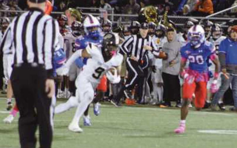 Wide receiver Sam Lawanson eludes the last of the Blue Devil defenders enroute to a touchdown.