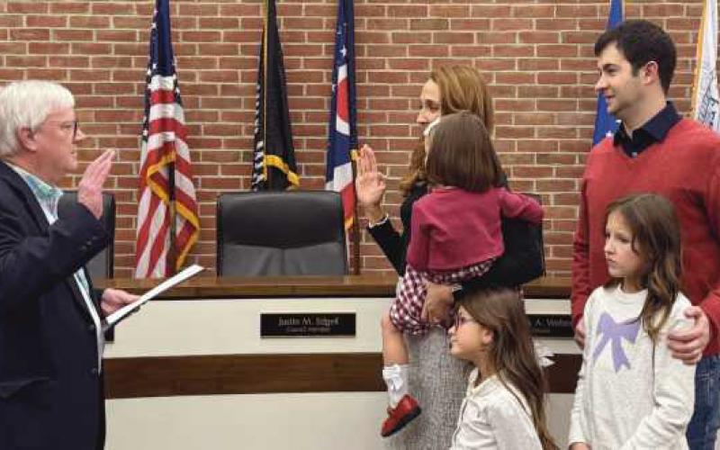 Current council member Tim McCarthy swore in newly-elected Erin O’Rear.