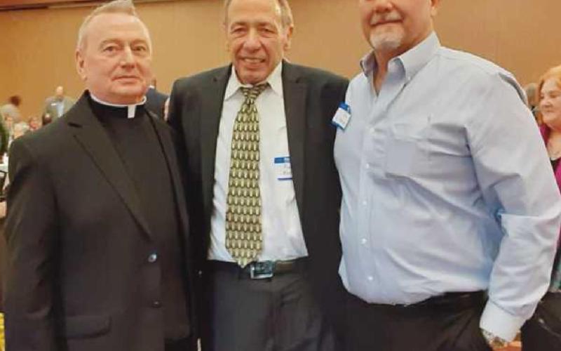 From left, Fr. Neil Kookoothe, Fred Moor and Joe D’Ambrosio.