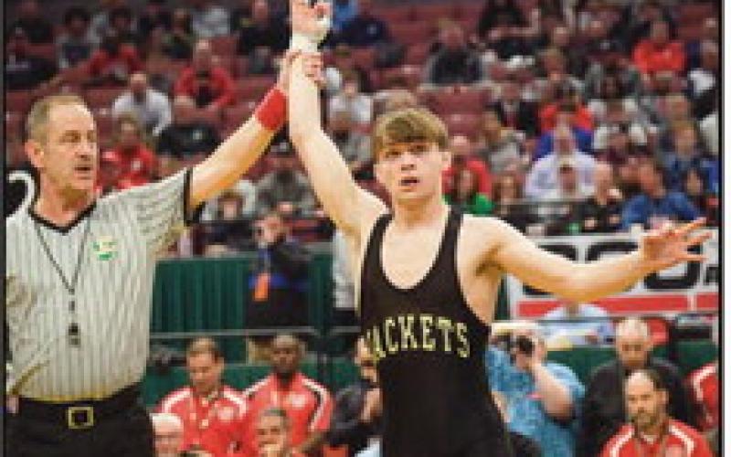 Marcus Blaze as a junior at PHS, capturing his third state title.