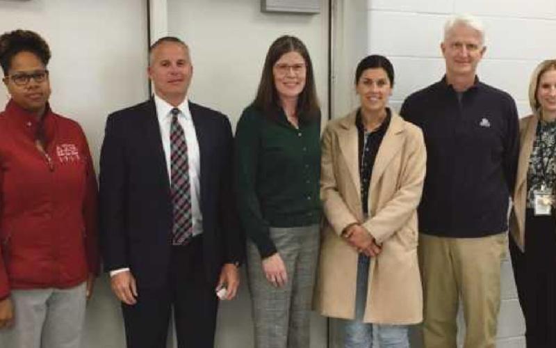 Members of the Business Advisory Council recognized at last month’s board of education meeting are, from left: Kelly Alter, Erica Parish, Jeremy Zeisloft, Susan Rowland Miller, Ashley Balester, Mayor Tom Mackin, Brook Price, assistant superintendent, and Eric Benington, school board president.