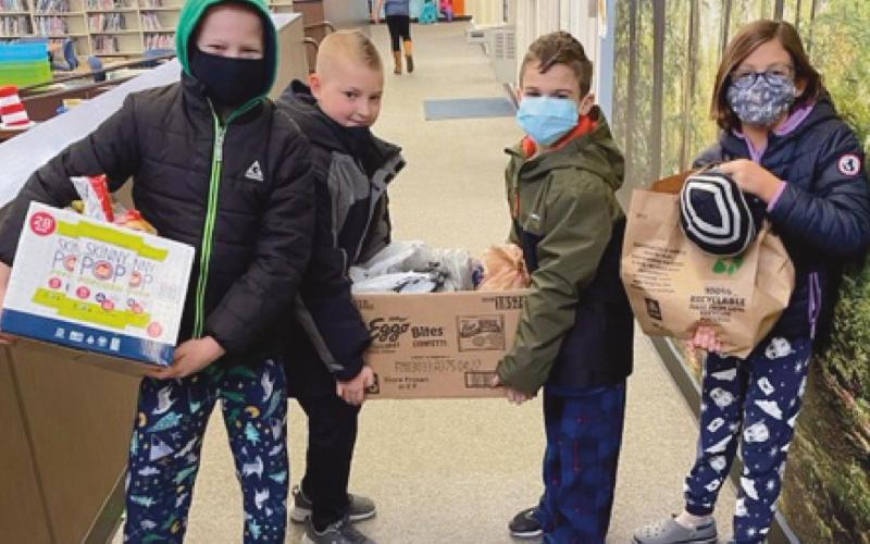 Woodland Elementary students conduct food drive
