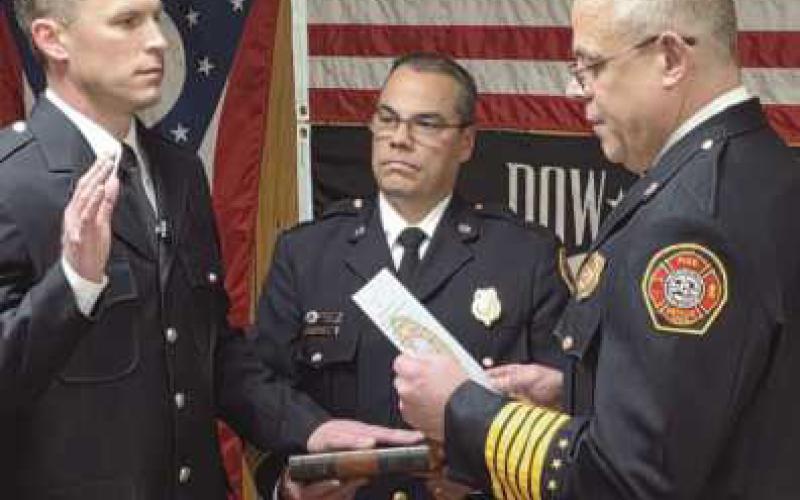 From left: Newly promoted Fire Captain Chad Hartman, Deputy Fire Chief James Rodriguez and Fire Chief Tom Brice.