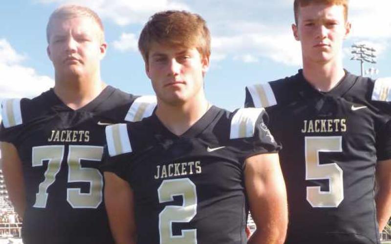 Just as tough 100 years later. PHS team captains, from left, Grant Zimmerly, Connor Walendzak and T.J. Takats.