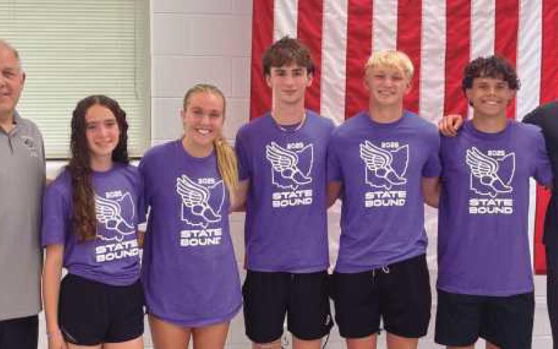From left: Board of Education President Susan Rowland Miller, Coach Jon Monheim, Laura Valette, Ava Beeks, Dominic Gibson-Willis, Christopher Purtee, Jr., Quinten Dworczyk, Anthony Clark and Coach Matt Gosses. Not pictured: Brody Bauman, Kaelyn Becken, Terry Cooper, Jr. and Natalie Sanders.