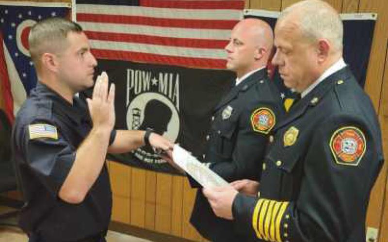 From left: New Firefighter/EMT Drew Lasley, Captain Michael Hampton III and Fire Chief Tom Brice.
