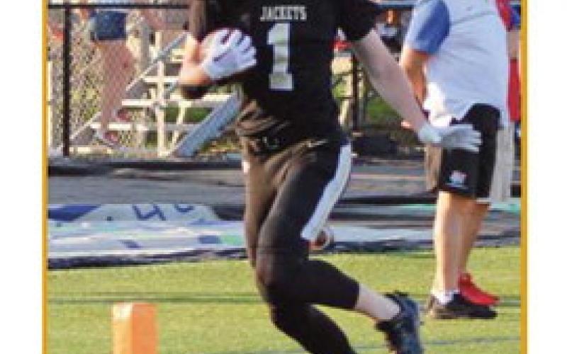 Wide receiver Gavin Fenneken hauls in a pass for a touchdown en route to the domination of St. Francis.
