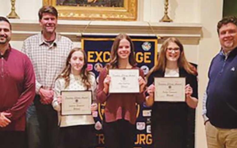 From left: Nick Tonegato, Perrysburg Junior High School teacher; Aaron Bortz, Perrysburg Exchange Club president; Sabrina Cleveland, St. Rose winner; Abby Van Dam, PJHS winner; Evelyn Souvenier, PJHS winner, and Aaron Kruse, St. Rose teacher. Not pictured: Abdallah Jallad, PJHS.