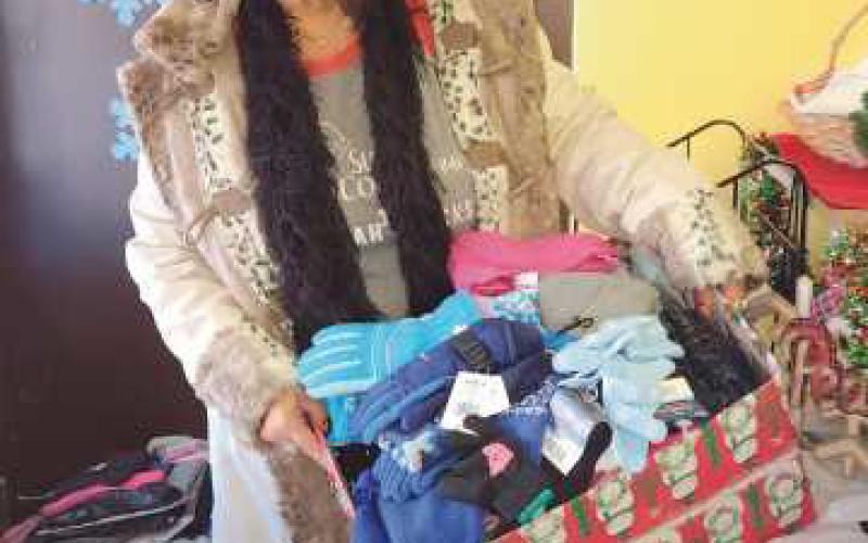 Journal collects winter accessories to benefit area families