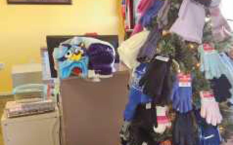 Journal collects winter accessories to benefit area families