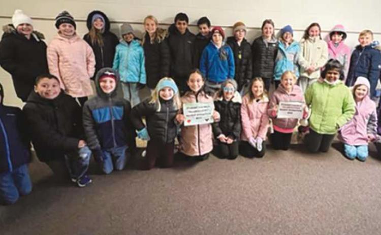 Woodland Elementary School student council partnered with the Perrysburg Schools social work department and Perrysburg Heights Community Center and collected enough food to feed 21 families for Thanksgiving.