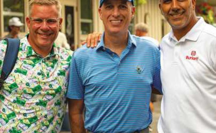 Community Reception and Awards Celebration Sponsors Greg Oplinger of Helix Solutions Group and Jimmy Droter of Moffat with Jameel Burkett, president and CEO of Burkett Restaurant Equipment and Supplies, at the 2026 Mike Burkett Memorial Golf Outing.