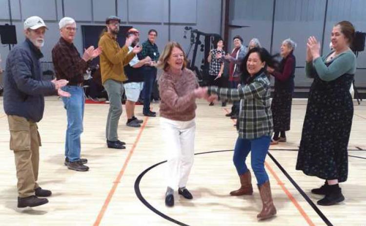 Walking the walk in the contra dance.