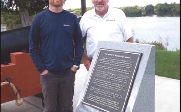 On September 18, a new podium and historical plaque were placed for the Riverside Park cannons. A formal dedication will take place at a future date. Perrysburg City workers Brody Walters and Greg Kuhr are pictured above.