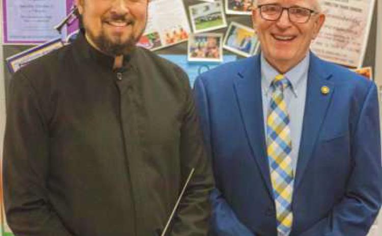 Conductor Travis Jürgens with City of Perrysburg Mayor Mark Weber.