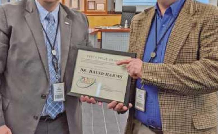 Penta instructor recognized for genocide teachings