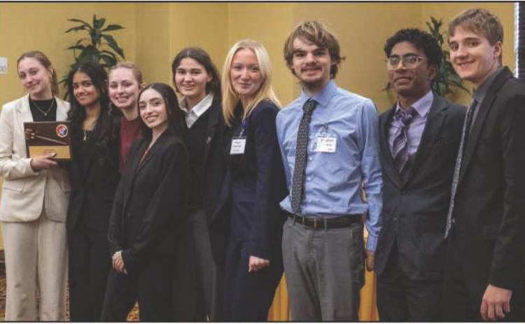 From left: Ella Hahn, Anushree Verma, Camryn Bruderly, Elena Fuentes, Anwyn Sawaya, Allison Harrold, Jonathan Severt, Avnish Shendge and Zachary Meyer. Photo by Freddy Fuentes