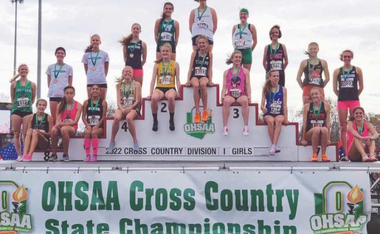 Perrysburg High School sophomore Natalie Sanders received the honor of sitting on the podium with her 14th overall finish at the 2022 OHSAA Division 1 Girls Cross Country Championship. Sanders completed the five kilometer race in 18 minutes 40.3 seconds.