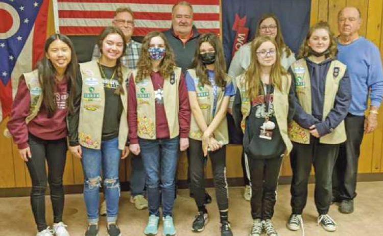Front row are members of Girl Scout Troop 10020, and back row–Trustees Gary Britten and Joe Schaller, fiscal officer Hannah Nelson and recreation director Bob Warnimont. The scouts delivered cookies as an expression of gratitude to township officials for allowing them to use the facilities for delivery and distribution of cookies for the annual sale.