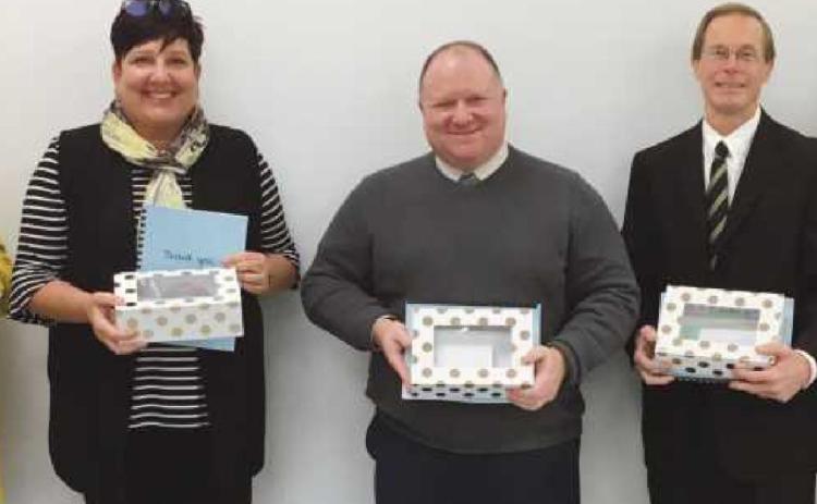 Perrysburg Board of Education was recognized for their work during School Board Recognition Month. From left are Sue Larimer, vice president; Lori Reffert; Eric Benington, president; Ray Pohlman and Kelly Ewbank.