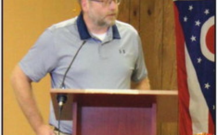 Chris Smalley, Wood County Park District director, addresses the trustees, seeking their support for a grant to purchase property adjacent to Reuthinger park.