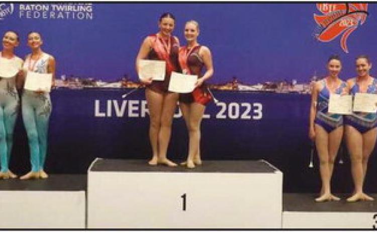 Local twirlers win international gold