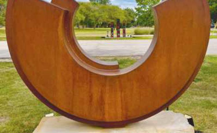 “Inverted Arch #6” by Ken Thompson earned first place honors at the Perrysburg Sculpture Walk at Woodlands Park.
