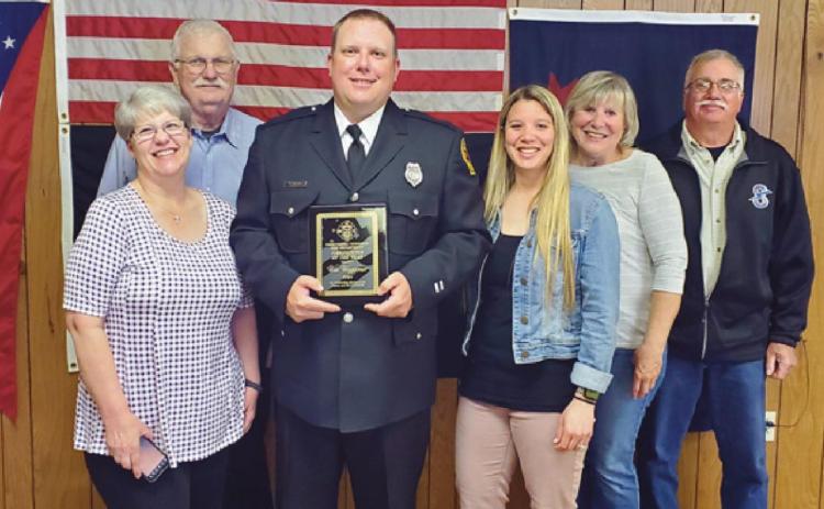 With Firefighter of the Year Wes Waggoner are members of his family, from left, stepmother Laura Arnold, Davis Arnold, fiancée Cassi Eaton and Cassi’s parents Carol and Ned Eaton.