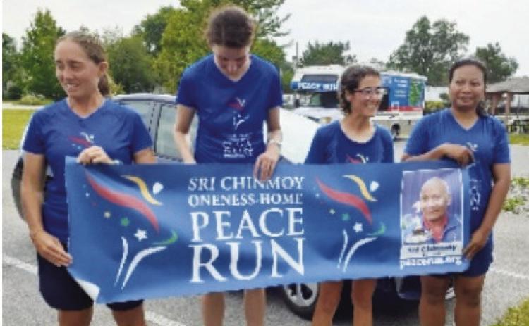 International Peace Runners return to Perrysburg Heights Community Center