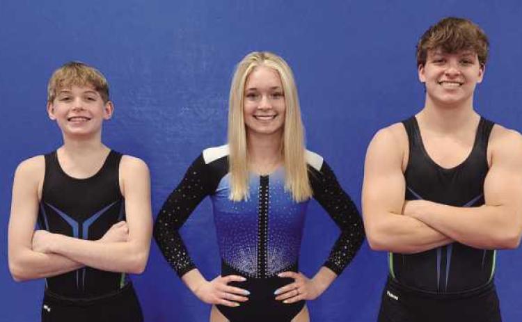 Pictured from left are gymnasts Josh Lankey, Aizlin Westcott and Ryan Lambdin.
