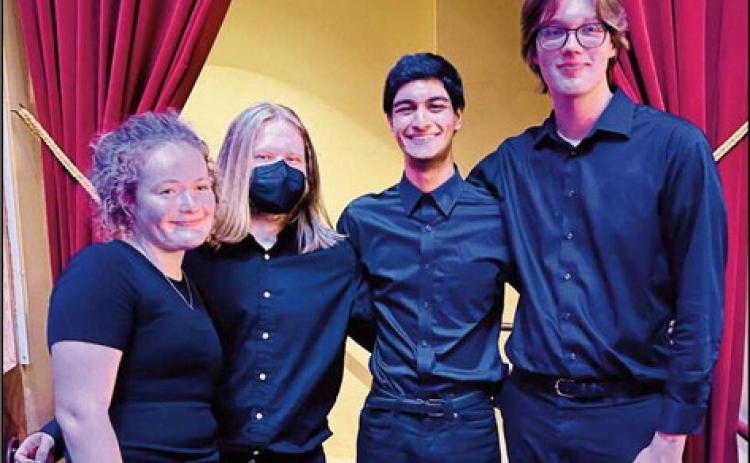 PHS orchestra students perform with Beatles vs. Stones show