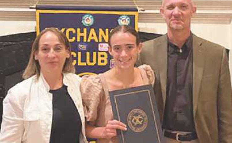 Laura Valette, the student of the month for September, is pictured with her parents Ludovic and Nadege Valette.
