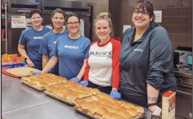 Buckeye employees preparing dinner for families staying at Ronald McDonald House.